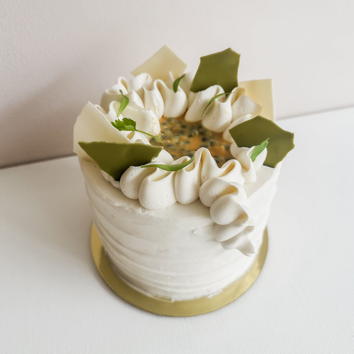 Coconut, passion fruit, and pandan layer cake